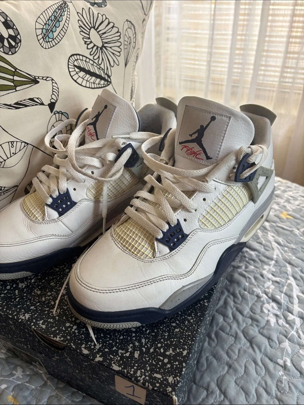 Nike White and Navy Air Jordan 4 Retro Sneakers
